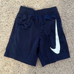 Navy and white Nike shorts